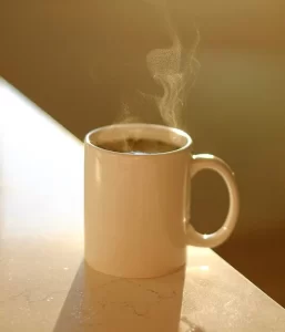 close up coffee cup table 1048944 13509972 close-up-coffee-cup-table_1048944-13509972
