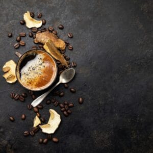mushroom chaga coffee superfood trend dry and fresh mushrooms and coffee beans on dark background e1625191401638 mushroom-chaga-coffee-superfood-trend-dry-and-fresh-mushrooms-and-coffee-beans-on-dark-background-e1625191401638