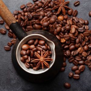 roasted coffee beans in turkish jezve 8UGZBB6 roasted-coffee-beans-in-turkish-jezve-8UGZBB6