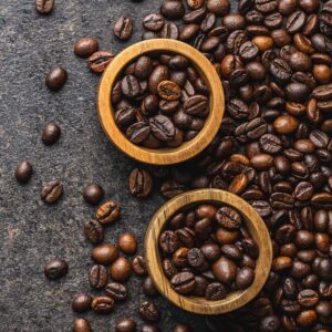 roasted coffee beans in wooden bowl HARMWE4 roasted-coffee-beans-in-wooden-bowl-HARMWE4